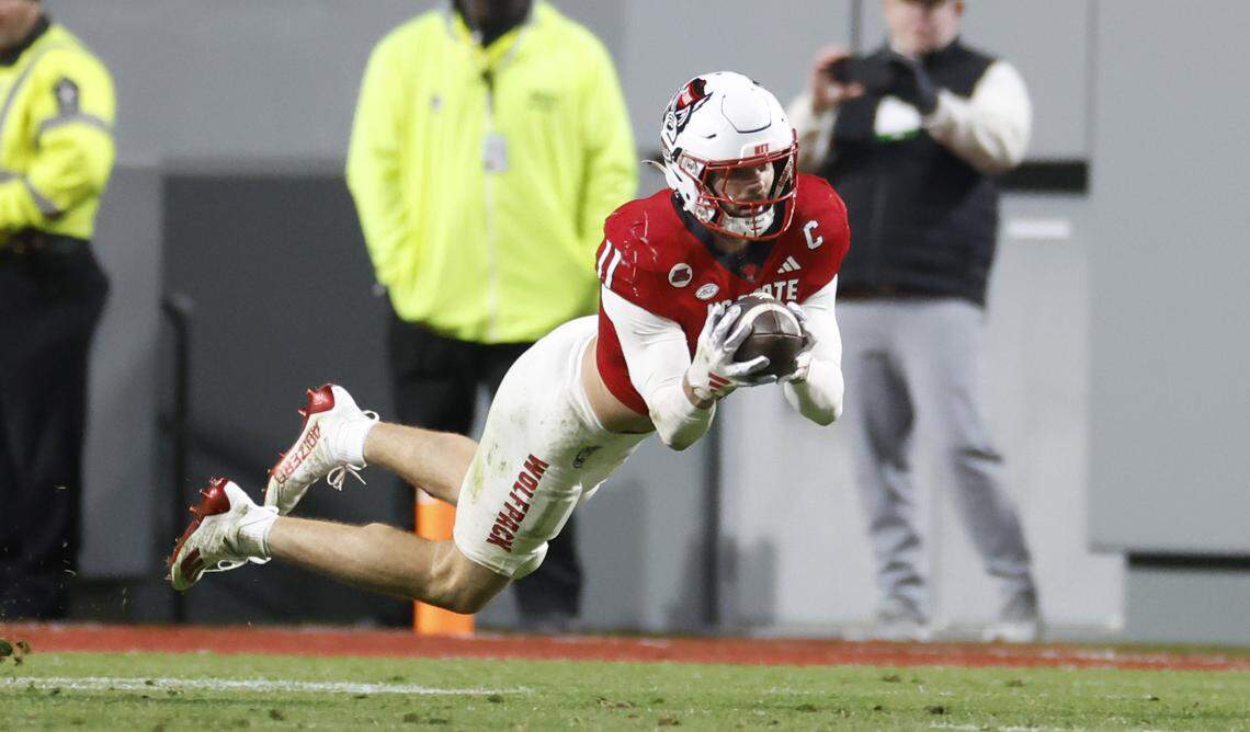 N.C. State linebacker Payton Wilson (11) intercepts the ball during the second half of N.C. State’s 39-20 victory over UNC at Carter-Finley Stadium in Raleigh, N.C., Saturday, Nov. 25, 2023.