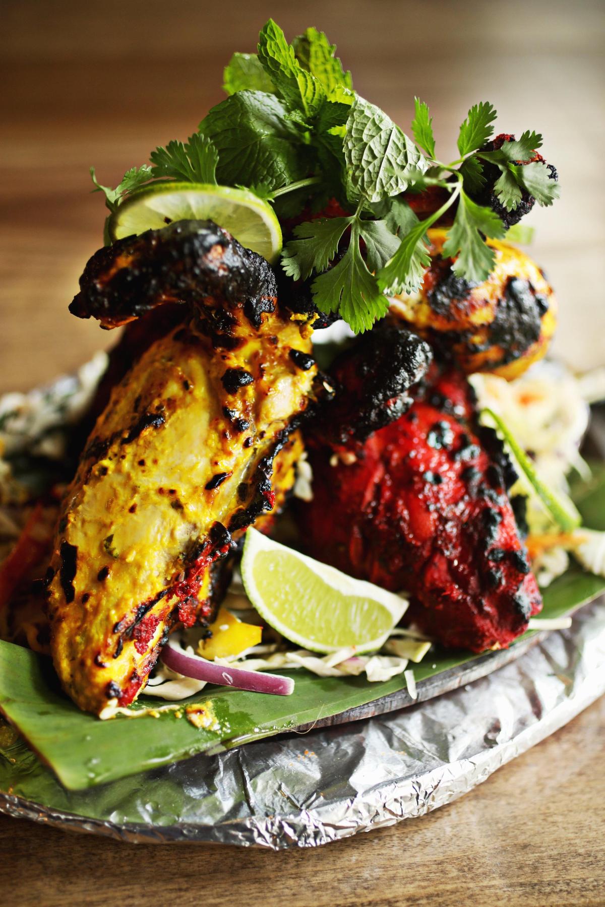 Cary’s Anjappar serves a tandoori chicken with a coating of spices that amps up the heat a couple of notches above the northern Indian tandoori norm, but the clay oven-cooked chicken is succulent and it’s served on the traditional sizzling cast iron skillet.