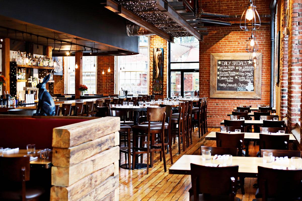 Tandem’s decor is well-suited to the eclectic offering, combining modern industrial elements with the warm patina of old wood and brick walls of the historic cotton mill in Chapel Hill where the restaurant is located.