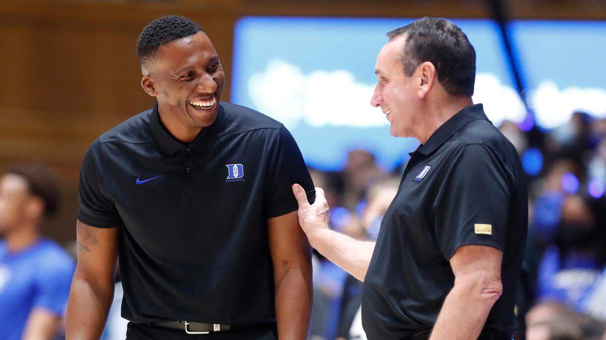 Duke head coach Mike Krzyzewski laughs with assistant coach Nolan Smith during Countdown to Craziness at Cameron Indoor Stadium in Durham, N.C., Friday, October 15, 2021.