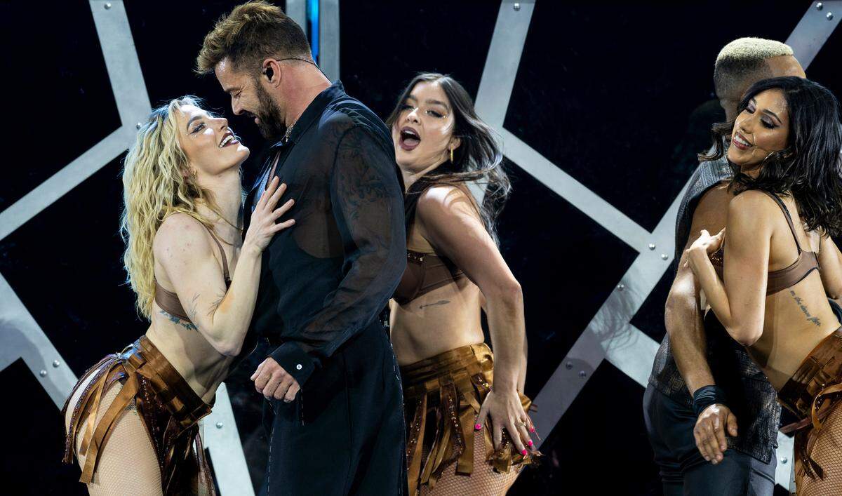 Ricky Martin performs with his dancers on “The Trilogy Tour” at Raleigh, N.C.’s PNC Arena, Thursday night, Feb. 29, 2024.