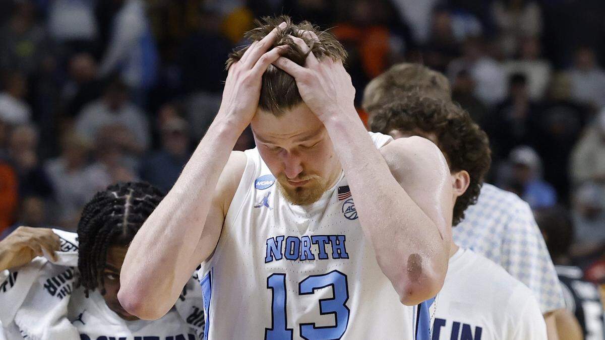 North Carolina's Henri Veesaar (13) walks off the court after VCU’s 82-78 overtime victory over UNC in the first round of the NCAA Men’s Basketball Tournament at  Bon Secours Wellness Arena in Greenville, S.C., Thursday, March 19, 2026.