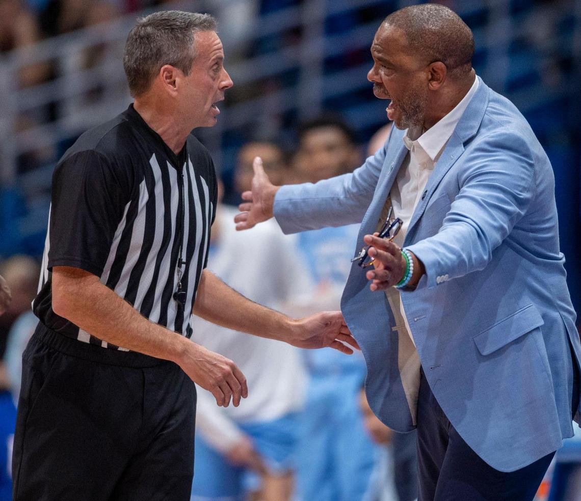 North Carolina coach Hubert Davis questions a call by official Doug Sirmons in the first half against Kansas on Friday, November 8, 2024 at Allen Fieldhouse in Lawrence, Kansas.