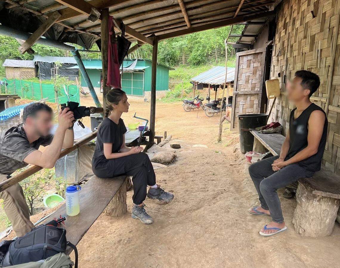Hanna Yates interviews a civilian at an Internally Displaced Person (IDP) camp in Karenni State, Burma.