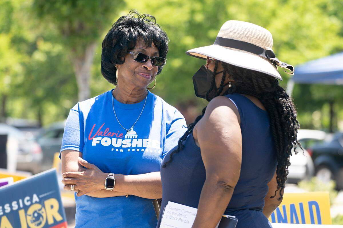 Valerie Foushee, left, talks with Brenda Ford Harding in Durham, during the 2022 primary election.