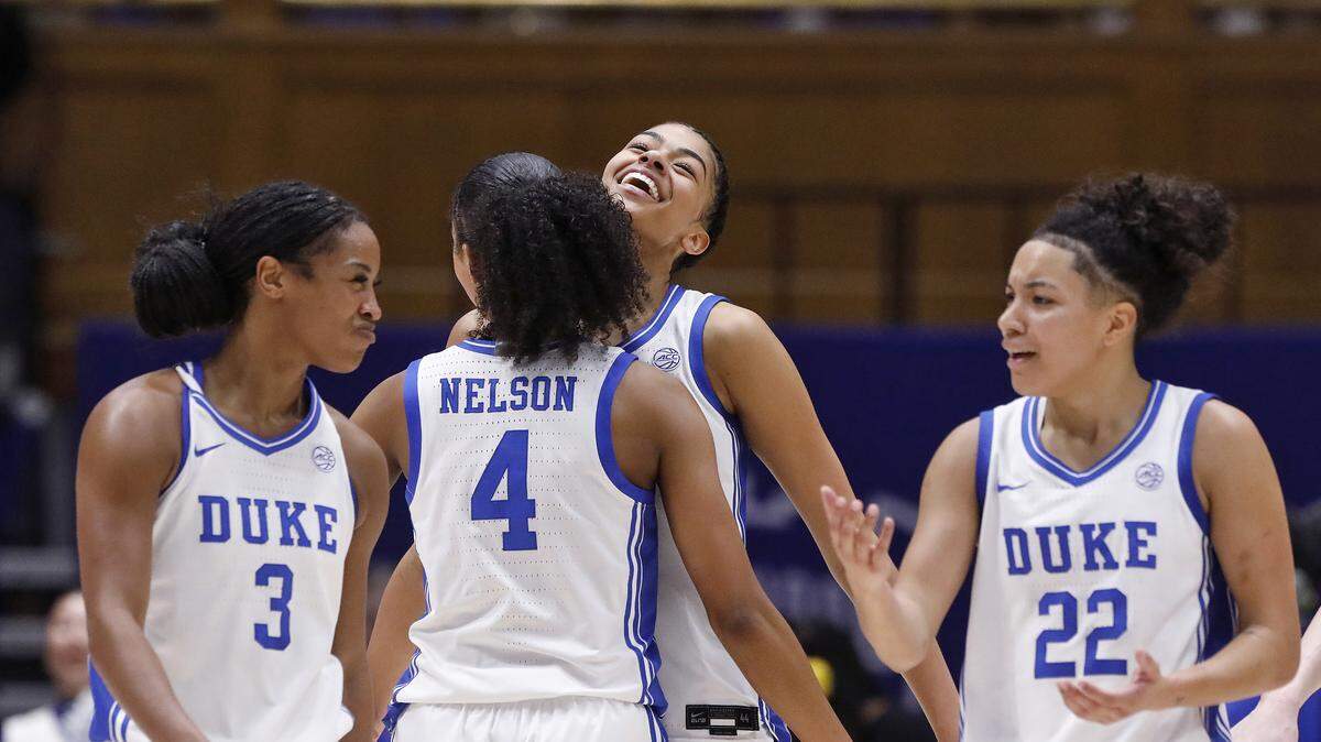 Duke’s Riley Nelson and Arianna Roberson, center, react during the second half of the Blue Devils’ 83-65 win over N.C. State on Thursday, Feb. 19, 2026, at Cameron Indoor Stadium in Durham, N.C. 