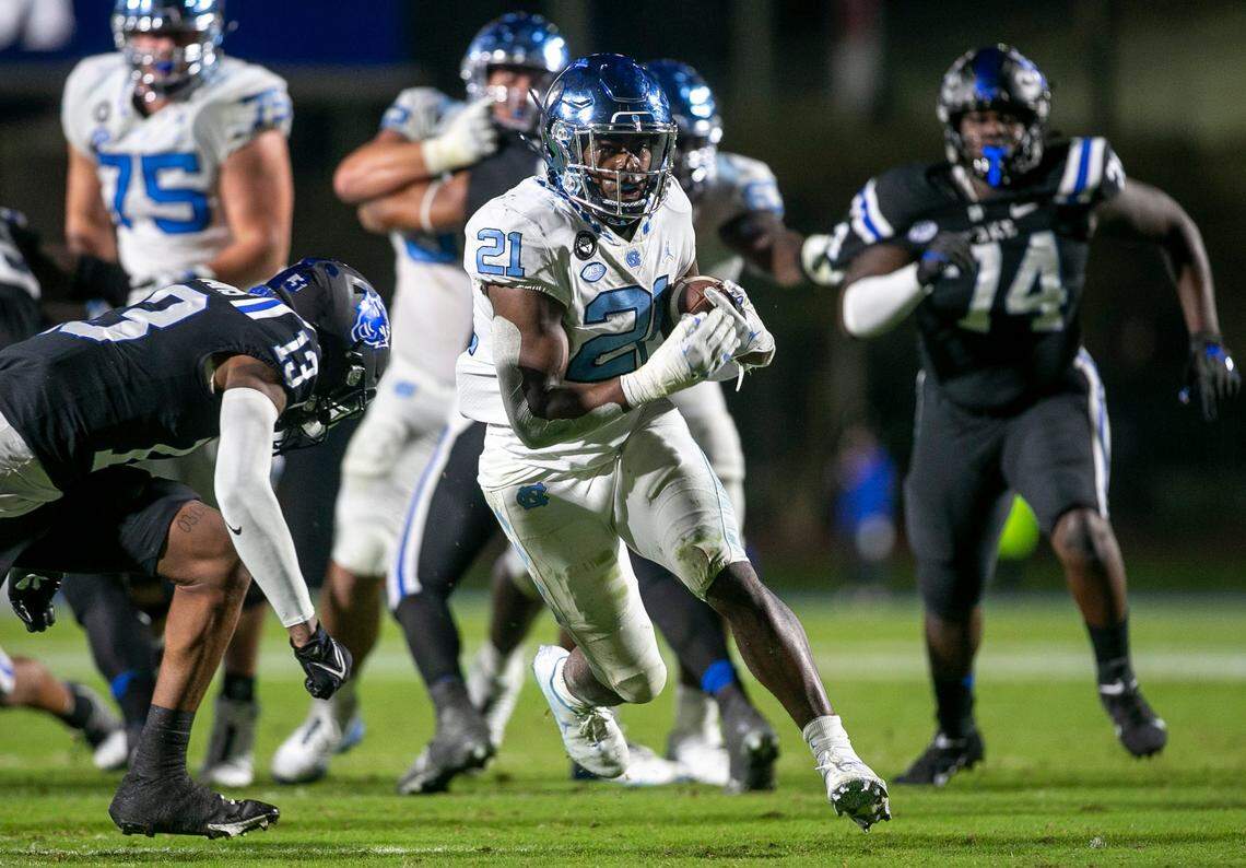 North Carolina’s Elijah Green (21) scores a touchdown on a 20-yard run in the third quarter against Duke on Saturday, October 15, 2022 at Wallace-Wade Stadium in Durham, N.C.