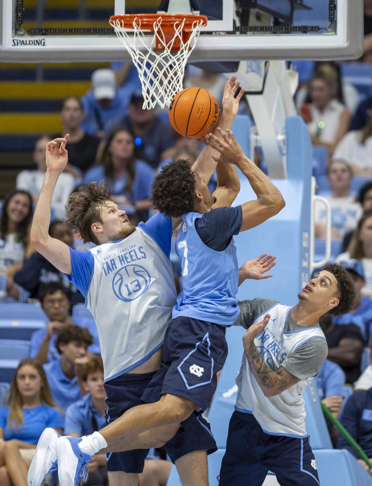 North Carolina center Henri Veesaar (13) blocks a shot by North Carolina guard Seth Trimble (7) during the Blue-White scrimmage on Saturday, October 4, 2025 at the Smith Center in Chapel Hill, N.C.