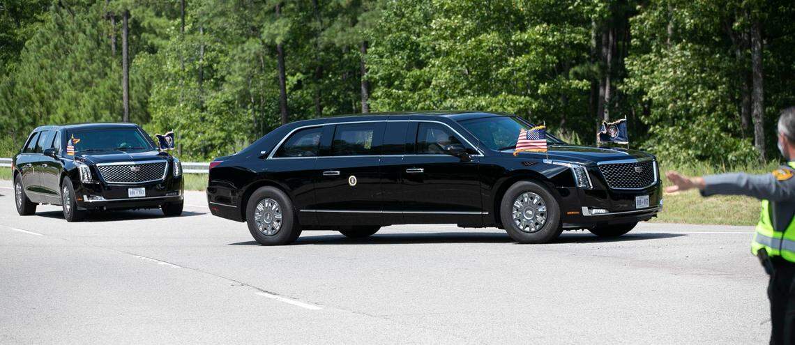 A pair of Presidential limousines arrive at the entrance Fujifilm Diosynth on Monday, July 27, 2020 in Morrisville, N.C. President Trump was scheduled to make a visit to Fujifilm Diosynth where they are are manufacturing a COVID-19 vaccine for Novavax.