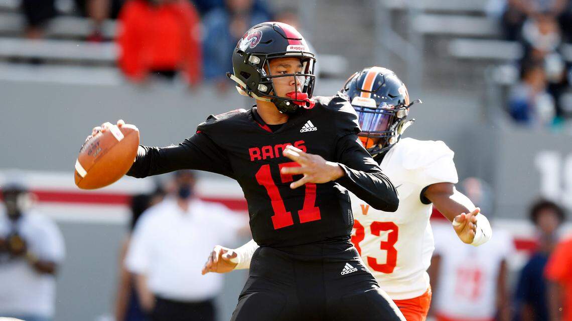 Rolesville’s Byrum Brown (17) prepares to pass during the first half of Rolesville High School’s game against Vance High School in the NCHSAA 4AA state championship at Carter-Finley Stadium in Raleigh, N.C., Saturday, May 8, 2021.