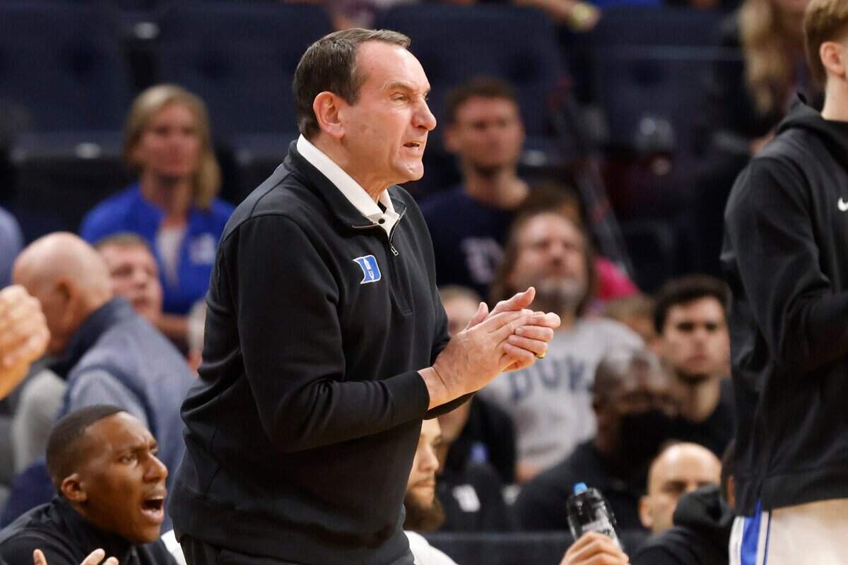 Duke head coach Mike Krzyzewski encourages his team during the first half of Dukes game against Arkansas in the NCAA Tournament West Regional finals at the Chase Center in San Francisco, Calif., Saturday, March 26, 2022.