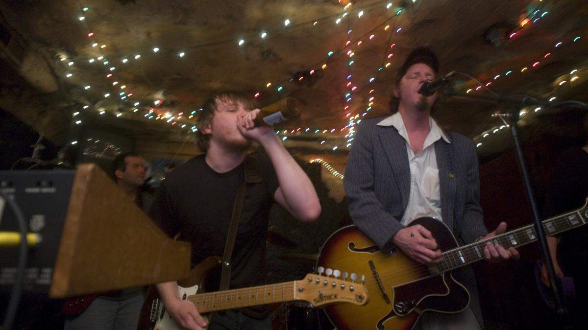 From left, Tony Raver and Brandon Herndon, the Twilighters, perform at the Cave in 2009.