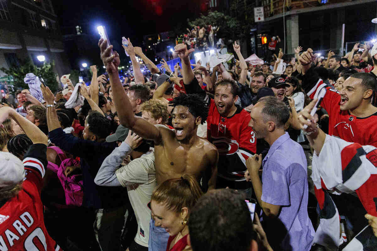 Fans celebrated in the streets after the Carolina Hurricanes won their second Stanley Cup in Glenwood South District on June 14, 2026, in Raleigh, North Carolina. The Hurricanes last won the Stanley Cup in 2006.