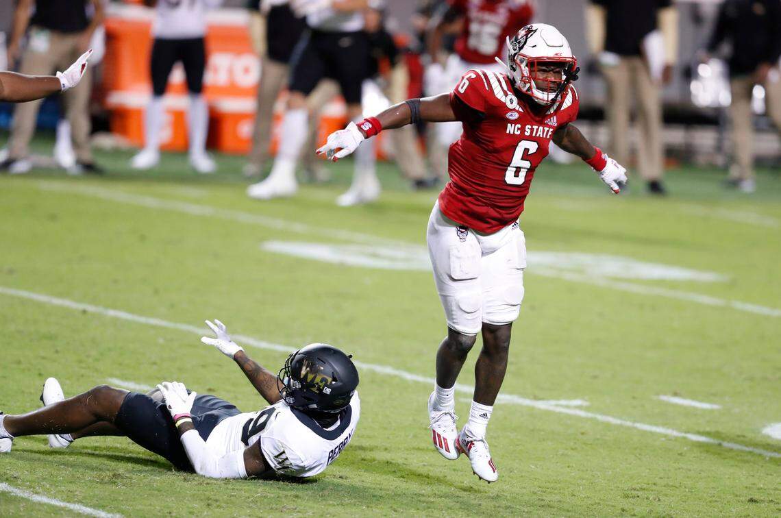N.C. State safety Jakeen Harris (6) celebrates breaking up a pass intended for Wake Forest wide receiver A.T. Perry (89) during the second half of N.C. State’s 45-42 victory over Wake Forest at Carter-Finley Stadium in Raleigh, N.C, Saturday, Sept. 19, 2020.