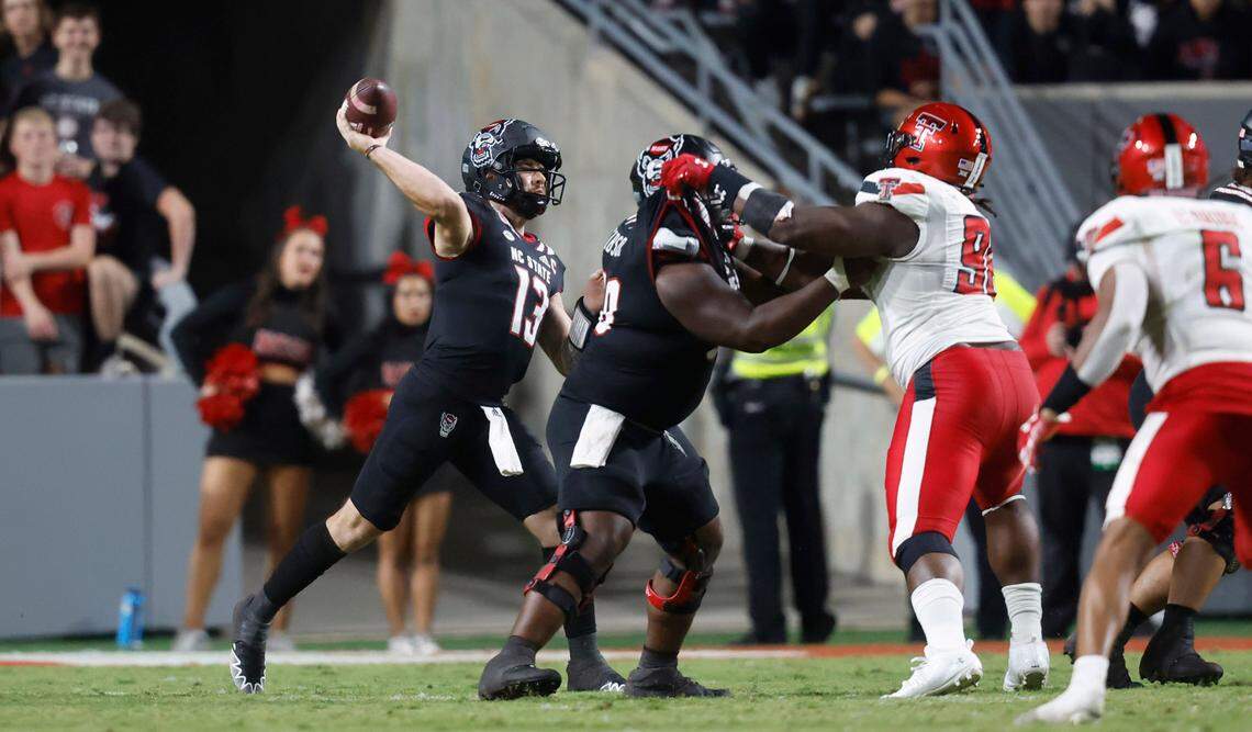 N.C. State quarterback Devin Leary (13) throws during the second half of N.C. State’s 27-14 victory over Texas Tech at Carter-Finley Stadium in Raleigh, N.C., Saturday, Sept. 17, 2022.