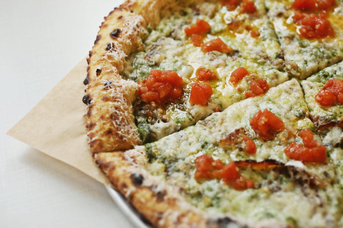The crispy pork belly pizza with turnip green puree, smoked tomato and aged provolone is a combination that works so well at Poole’side Pies that it will come as no surprise to anyone familiar with Ashley Christensen’s uncanny instinct for flavors.