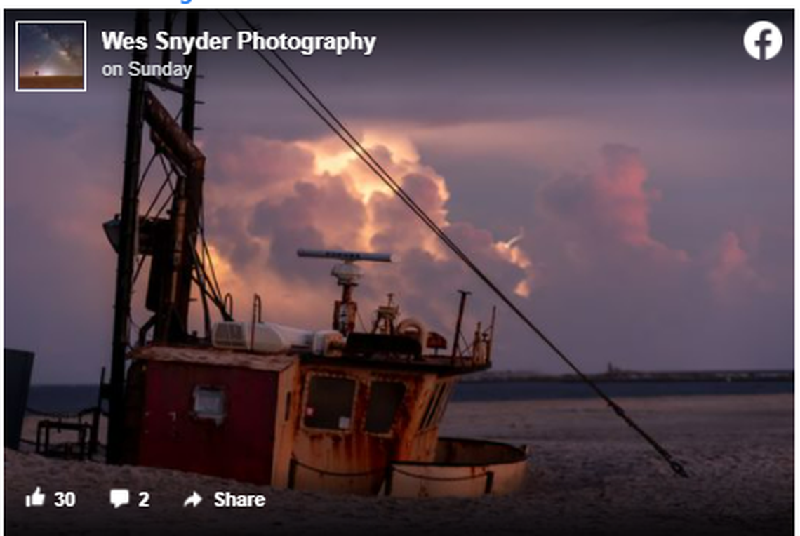 Professional photographer Wes Snyder captured multiple images of lightning behind the Ocean Pursuit shipwreck at Cape Hatteras National Seashore.