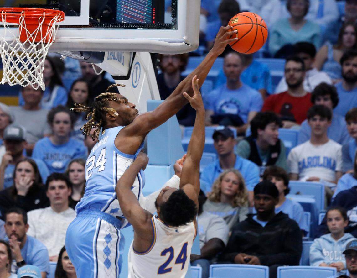 North Carolina’s Jae’Lyn Withers blocks a shot by UC Riverside’s Barrington Hargress during the second half of the Tar Heels’ 77-52 win on Friday, Nov. 17, 2023, at the Smith Center in Chapel Hill, N.C.