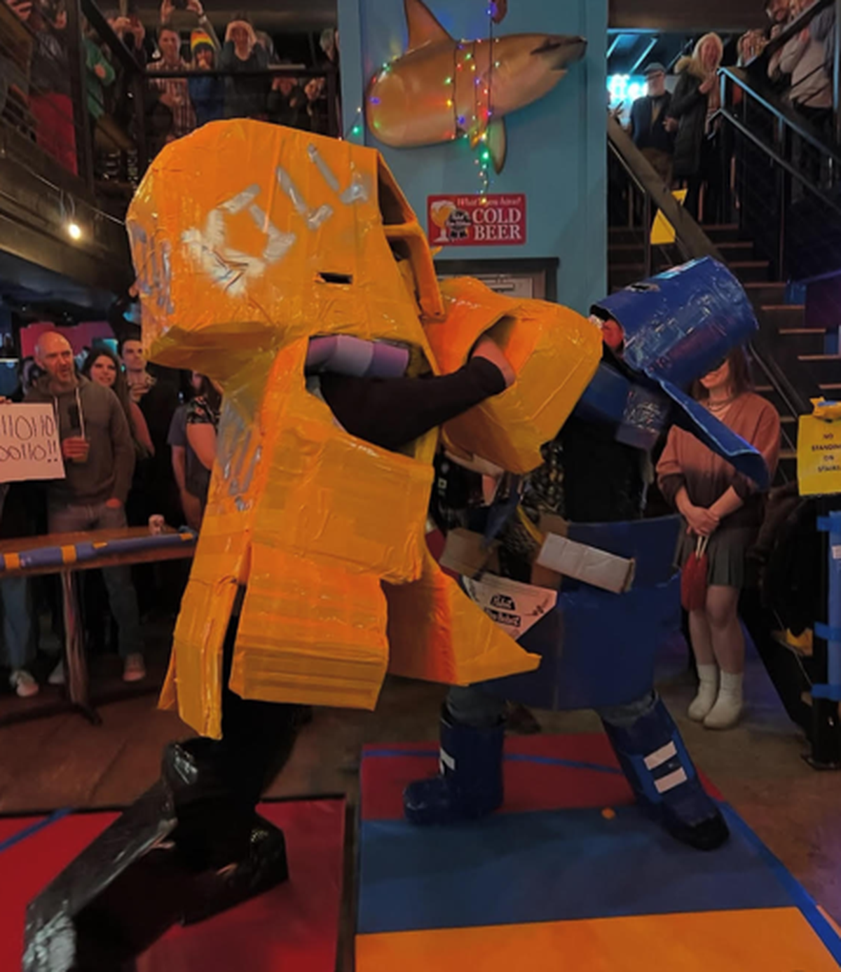 Killdozer fights Pabst Blue Robot during a Durham bout of Giant Robot Fight Club