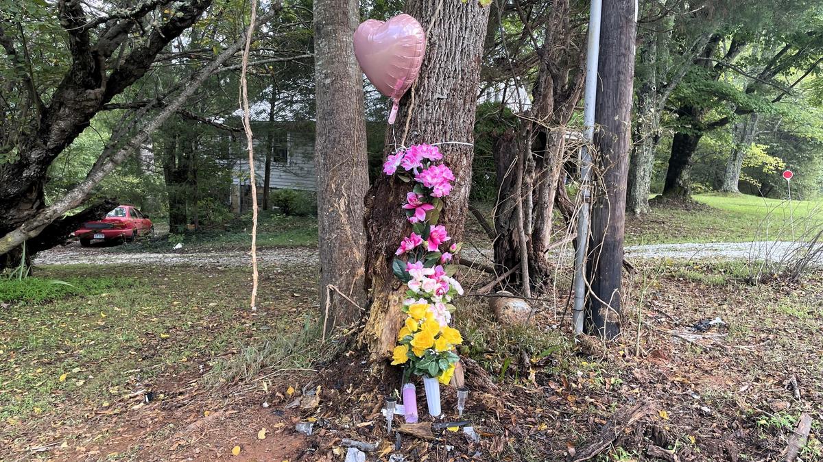 A small memorial was erected Wednesday along N.C. 86 where three people died in an Orange County crash on Sept. 24, 2024.