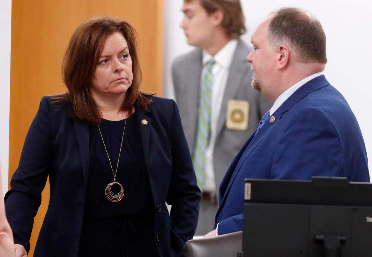 Sen. Vickie Sawyer talks with Sen. Ralph Hise before during the N.C. Senate Education committee meeting in Raleigh on July 21, 2021.