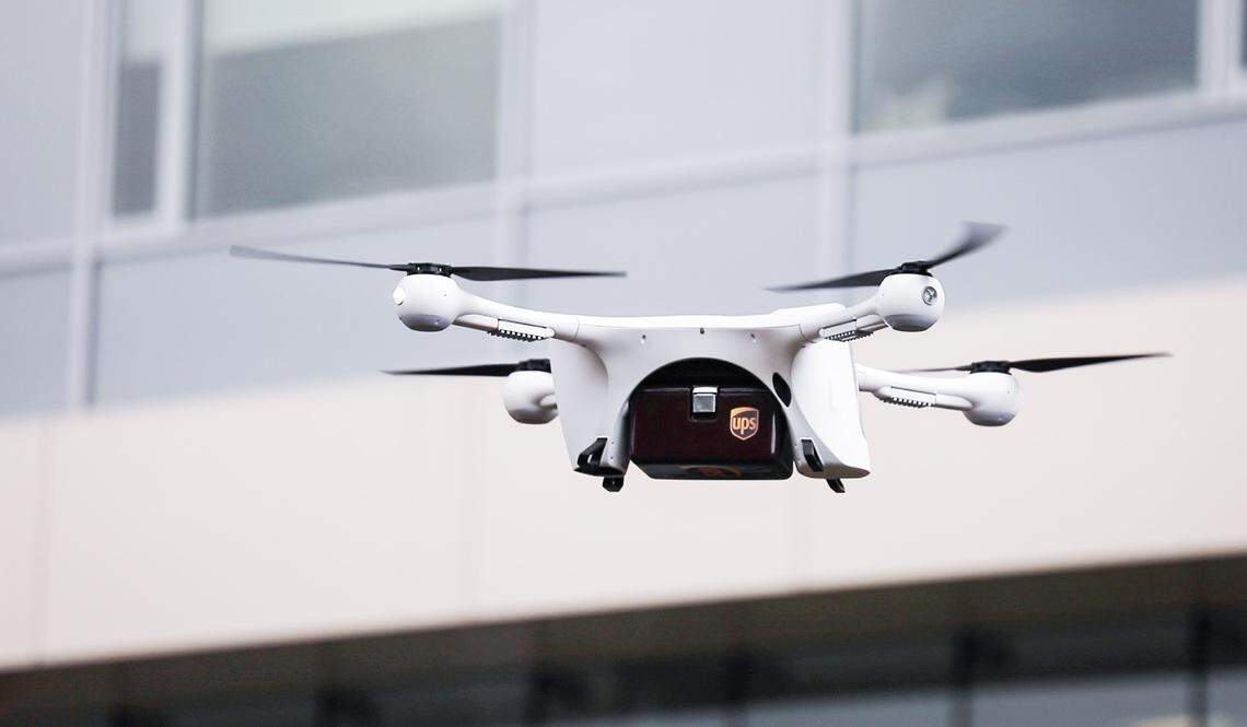 A Matternet M2 drone lowers for landing with a UPS carriage box attached at WakeMedÕs main hospital campus on Tuesday, March 26, 2019. The UPS carriage, delivered by drone, will hold things like blood samples and other items to be delivered to laboratories on WakeMedÕs campus and help them reach their destinations in three minutes, rather than up to an hour.