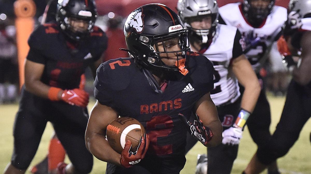 Rolesville’s Isiah Jones (2) runs for yardage against Butler during the second half. The Rolesville Rams and the Butler Bulldogs met in a non-conference football game in Rolesville N.C. on August 18, 2023.