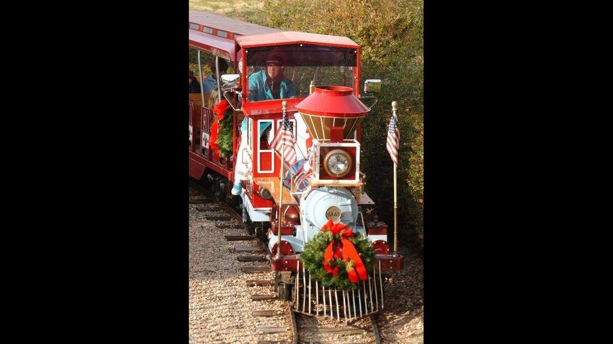The Holiday Express in Pullen Park features holiday lights, games, carolers, carousel rides, appearances from Santa and more.