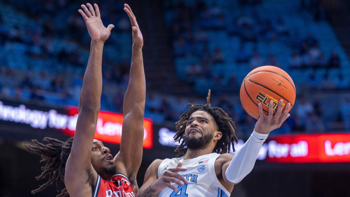 North Carolina’s R.J. Davis (4) drives to the basket against Radford’s Justin Archer (0) in the first half on Monday, November 6, 2023 at the Dean Smith Center in Chapel Hill, N.C.