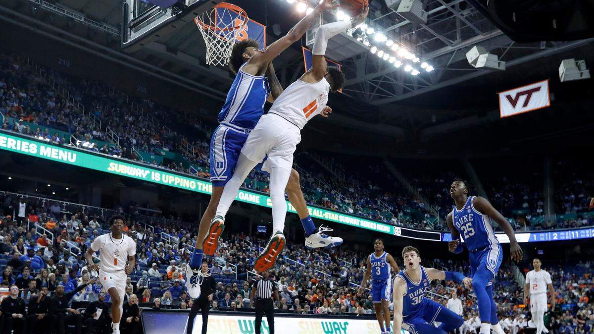 Duke’s Dereck Lively II (1) blocks the shot by Miami’s Jordan Miller (11) during Duke’s 85-78 victory over Miami in the semifinals of the ACC Men’s Basketball Tournament in Greensboro, N.C., Friday, March 10, 2023.