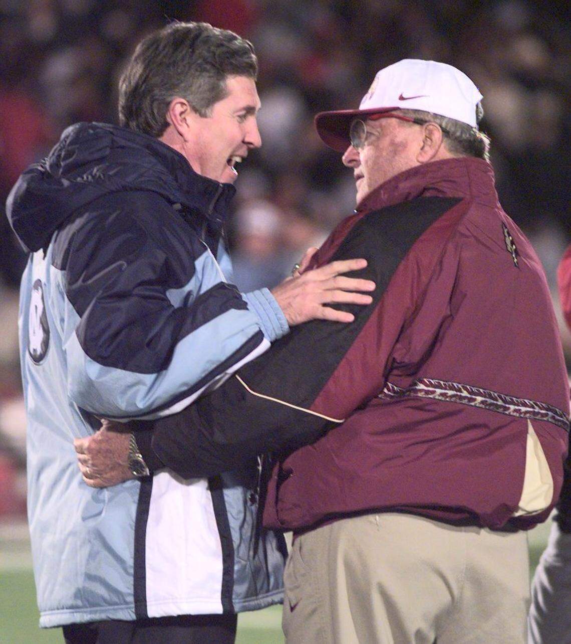 North Carolina coach Mack Brown (left) and Florida State coach Bobby Bowden chat before the 1997 UNC-FSU game in Chapel Hill, when both teams were ranked in the top five.