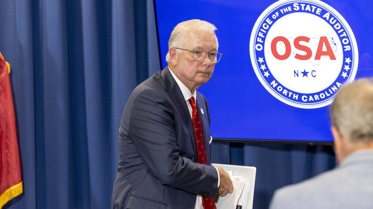 State Auditor Dave Boliek recommends dozens of changes during a press conference highlighting a 435-page audit report Monday, Aug. 4, 2025, at the Albemarle Building in Raleigh. Boliek, a Republican, made an audit of the DMV part of his platform when he was elected last fall.