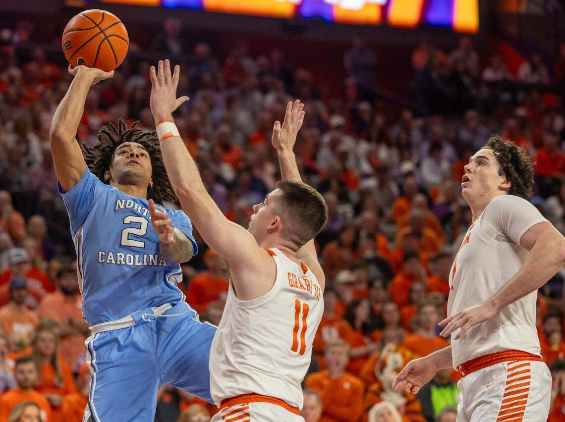 North Carolina’s Elliot Cadeau (2) drives to the basket against Clemson’s Joseph Girard III (11) during the first half on Saturday, January 6, 2024 at Littlejohn Coliseum in Clemson, S.C.