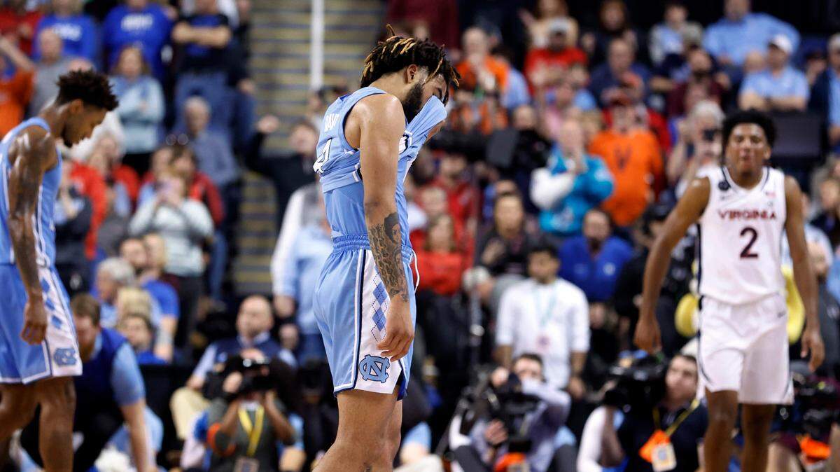 North Carolina’s RJ Davis (4) heads towards the bench as time runs out in Virginia’s 68-59 victory over UNC in the quarterfinals of the ACC Men’s Basketball Tournament in Greensboro, N.C., Thursday, March 9, 2023.