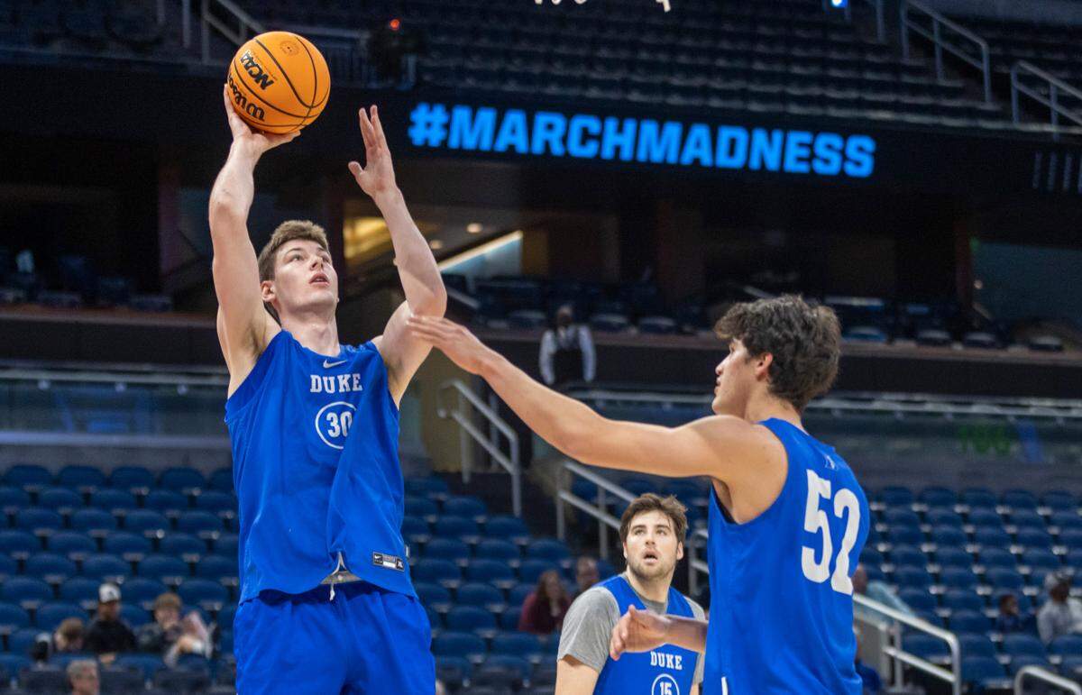 Duke’s Kyle Filipowski (30) works on his shooting form during the Blue Devils’ practice on Wednesday, March 15, 2023 at the Amway Center in Orlando, Fla. Duke will open NCAA tournament play against Oral Roberts.