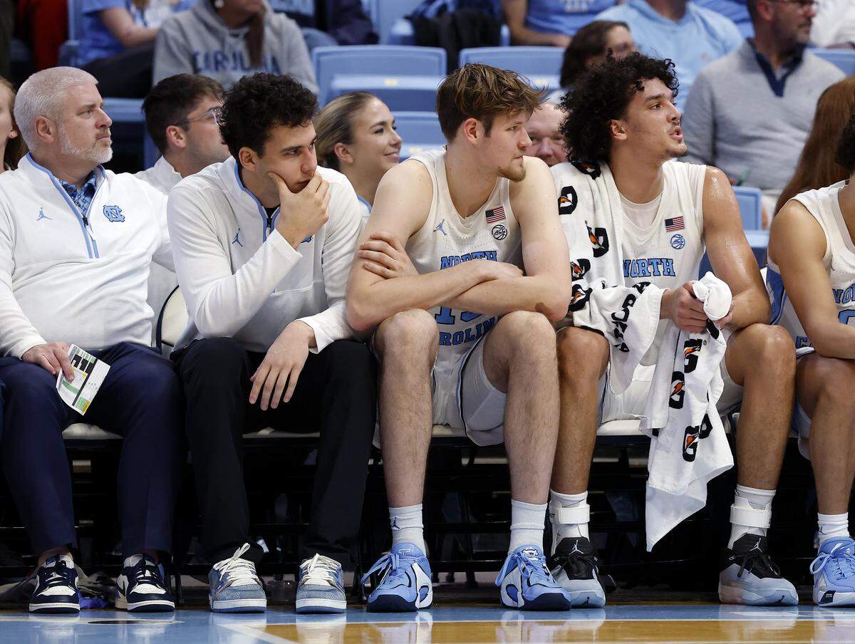 Luka Bogavac, second from left, sits on the bench during the second half of the Tar Heels’ 95-53 exhibition win over Winston-Salem State on Wednesday, Oct. 29, 2025, at the Smith Center in Chapel Hill, N.C.