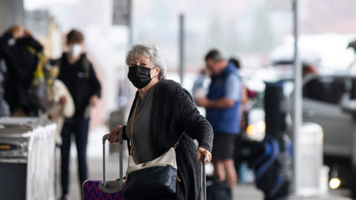 A traveler arrives at RDU International Airport in Morrisville, N.C. on Monday, Nov. 22, 2021.