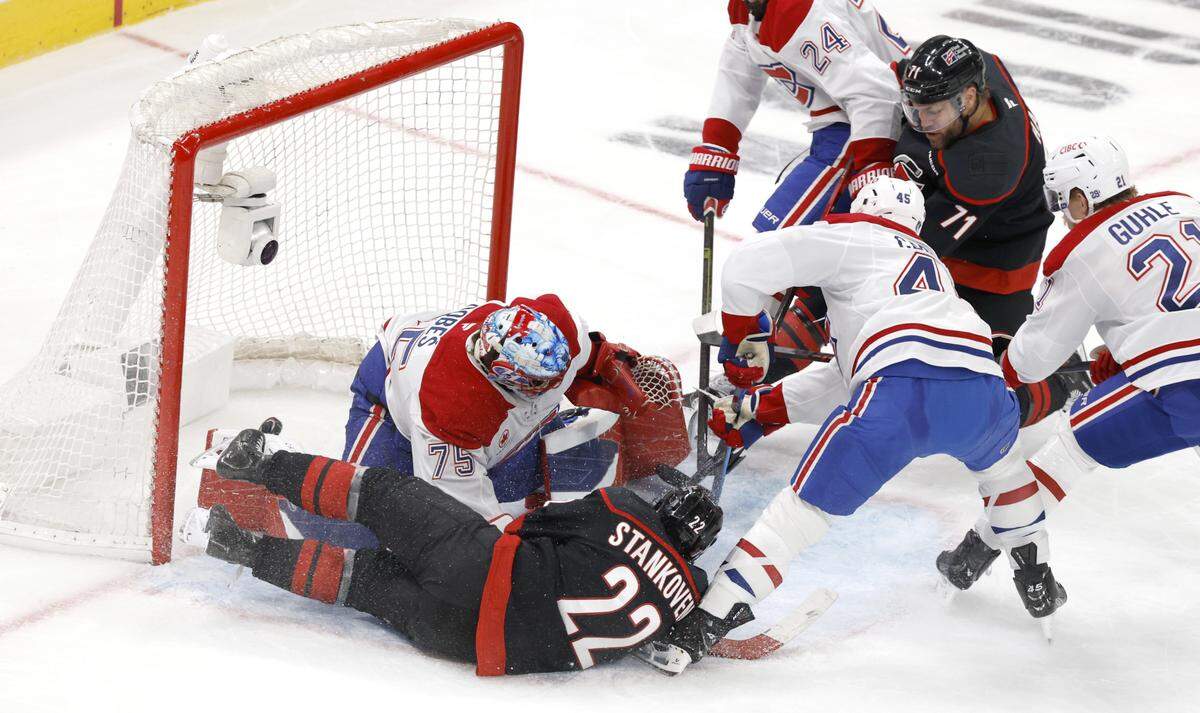 Carolina's Taylor Hall (71) scores on Montréal's Jakub Dobes (75) during the first period of the Hurricanes’ game against the Canadiens in game five of the Eastern Conference Finals at the Lenovo Center Friday, May 29, 2026.
