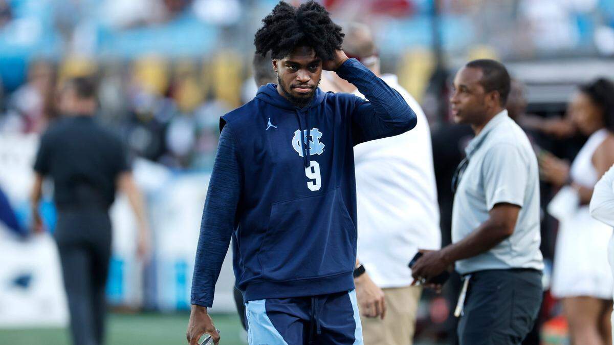 North Carolina wide receiver Tez Walker (9) walks down the field before UNC’s game against South Carolina in the Duke’s Mayo Classic at Bank of America Stadium in Charlotte, N.C., Saturday, Sept. 2, 2023.