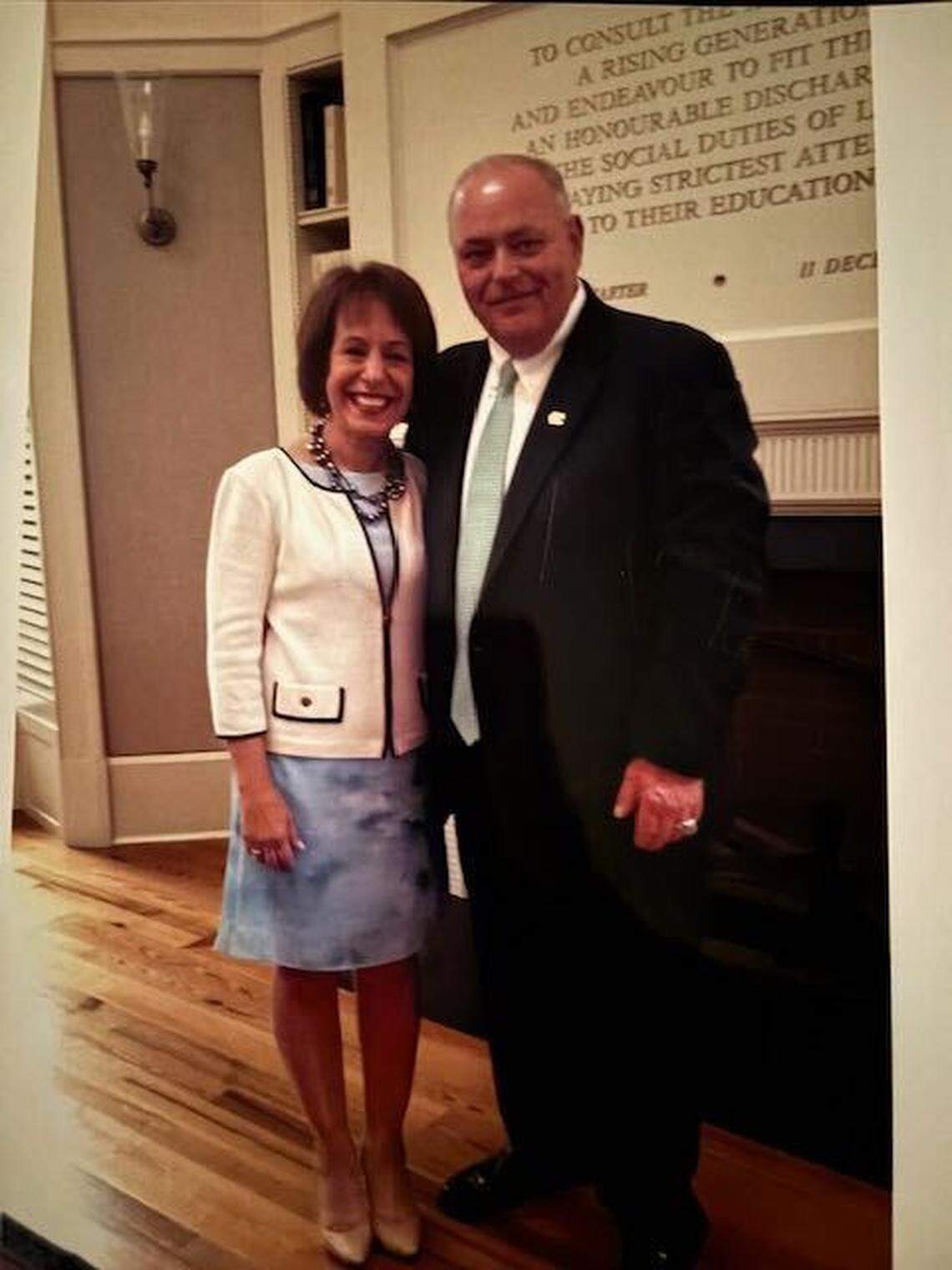 Former UNC chancellor Carol Folt poses with James Spurling, the school’s longtime director of Kenan Stadium.