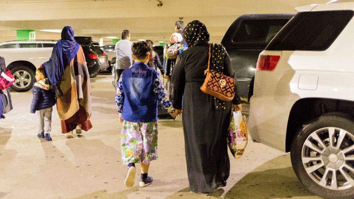 An Afghan family arrives in Sacramento where they will resettle with the help of World Relief Sacramento, a refugee resettlement agency. Taken August 2021.