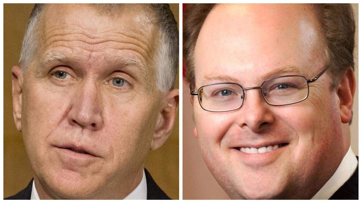 Republican U.S. Sen. Thom Tillis, left, and NC Democratic Party Chairman Wayne Goodwin