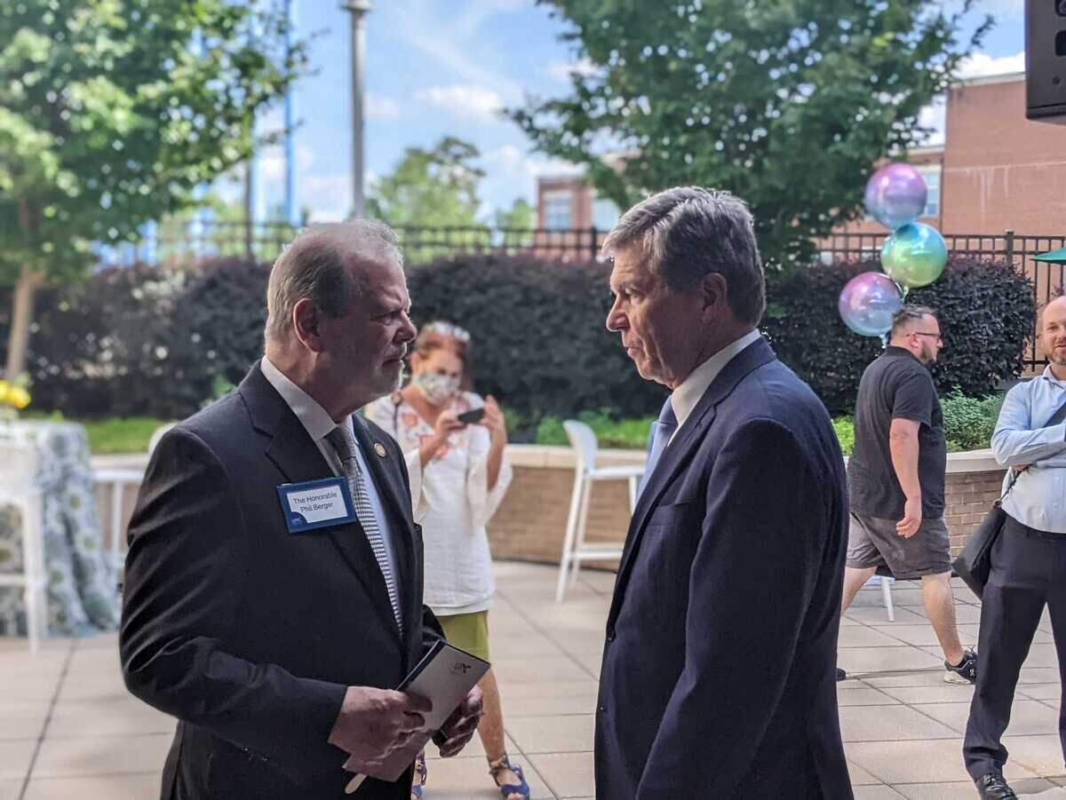 Senate leader Phil Berger, left, and Gov. Roy Cooper attend a dedication ceremony Monday, Sept. 19, 2022, at Chapel Hill’s N.C. Cancer Hospital, which was renamed in honor of the late North Carolina state Sen. Marc Basnight.