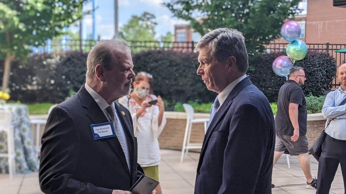 Senate leader Phil Berger, left, and Gov. Roy Cooper attend a dedication ceremony Monday, Sept. 19, 2022, at Chapel Hill’s N.C. Cancer Hospital, which was renamed in honor of the late North Carolina state Sen. Marc Basnight.