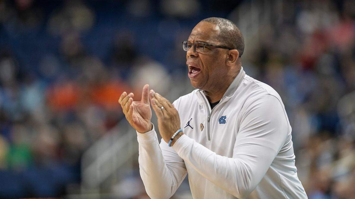 North Carolina coach Hubert Davis applauds his team as they open a lead over Boston College in the second round of the ACC Tournament on Wednesday, March 8, 2023 at the Greensboro Coliseum in Greensboro, N.C.