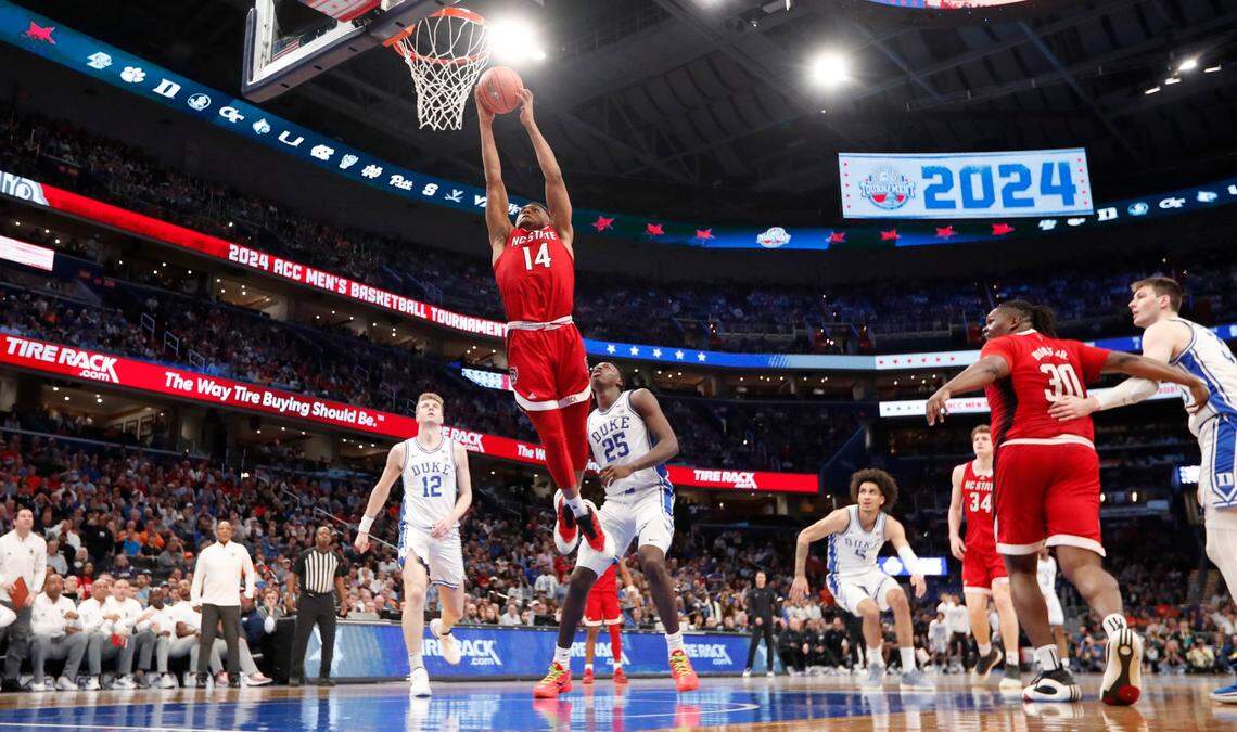 N.C. State’s Casey Morsell (14) heads to slam in two during N.C. State’s 74-69 victory over Duke in the quarterfinal round of the 2024 ACC Men’s Basketball Tournament at Capital One Arena in Washington, D.C., Thursday, March 14, 2024.