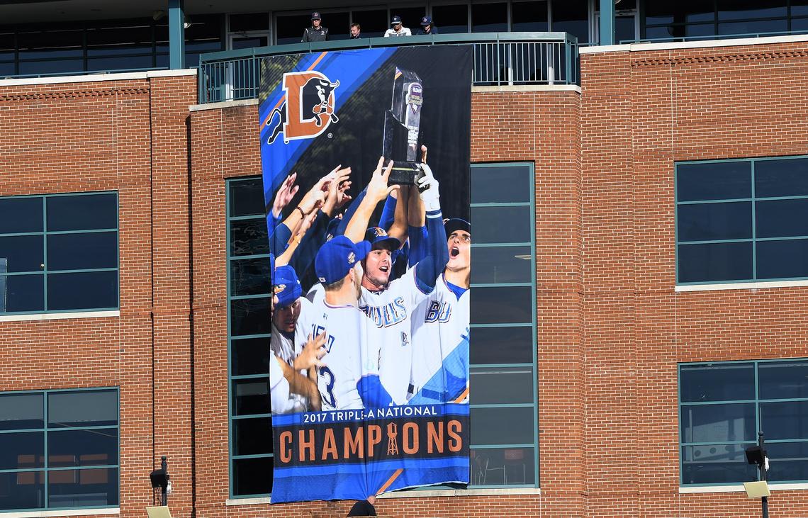 The 2017 Triple A National Championship banner is unveiled as the 2018 baseball season starts for the Durham Bulls Thursday, April 5, 2018 in Durham, N.C.