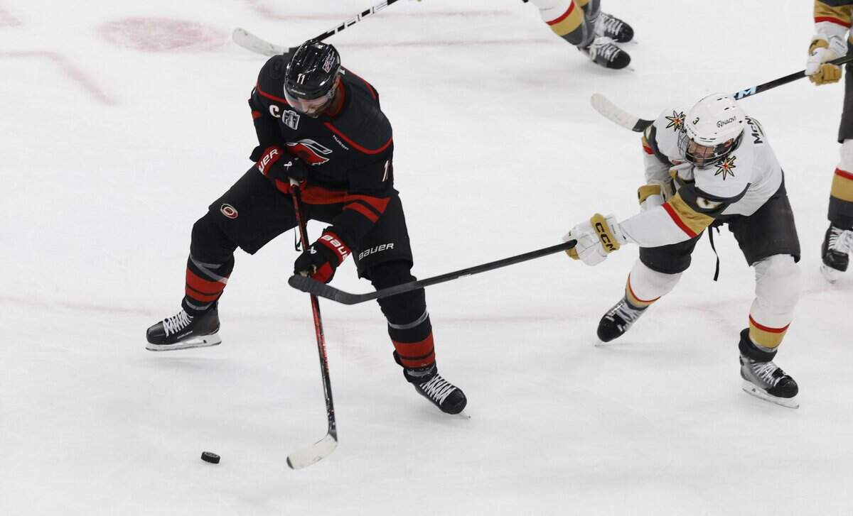 Carolina's Jordan Staal (11) keeps the puck from Vegas' Brayden McNabb (3) in the second period of the Hurricanes’ game against the Golden Knights in the fifth game of the Stanley Cup Final at the Lenovo Center in Raleigh, N.C., Thursday, June 11, 2026.