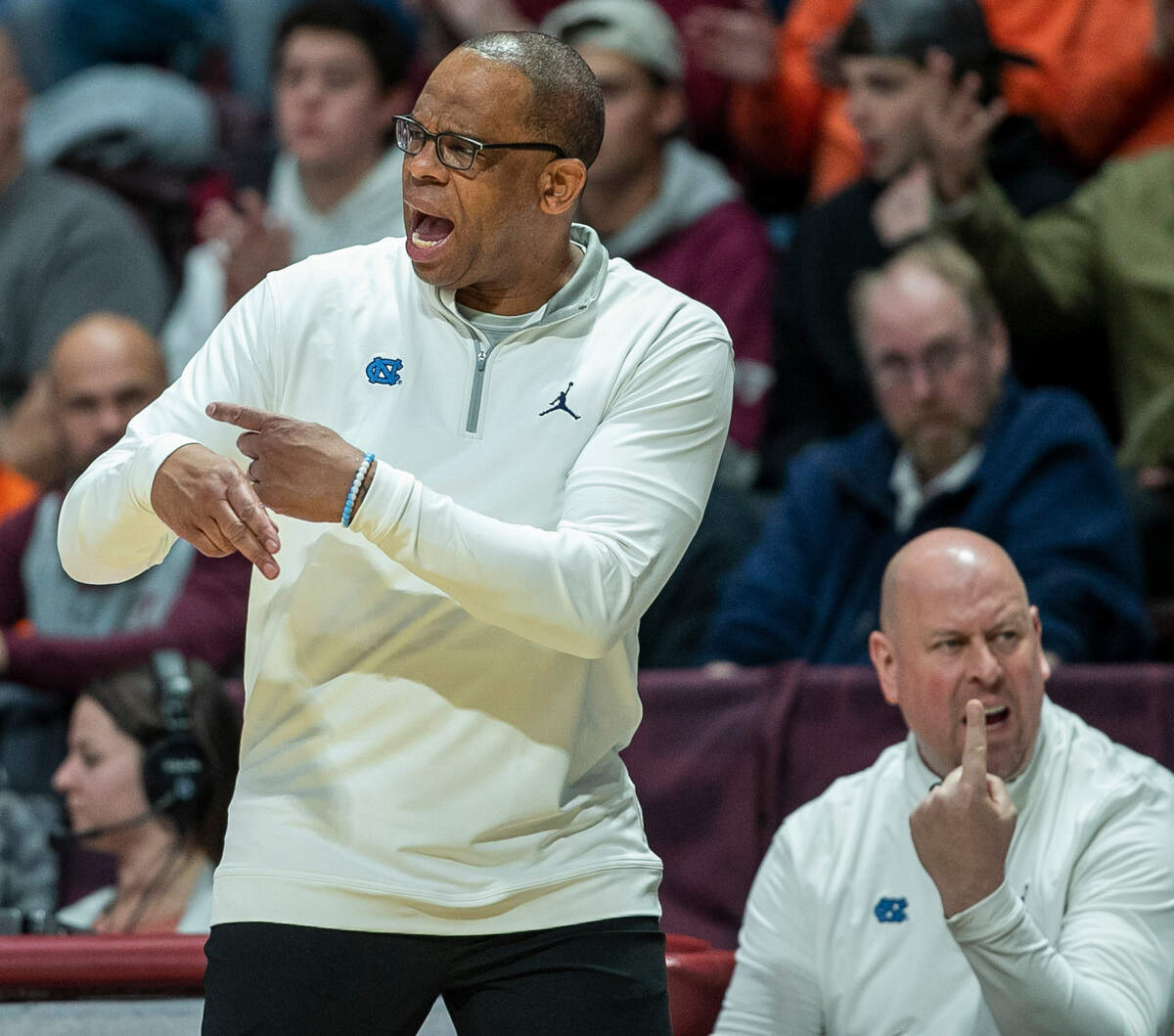 North Carolina coach Hubert Davis signals to Pete Nance that he traveled, during the second half against Virginia Tech on Sunday, December 4, 2022 at Cassell Coliseum in Blacksburg, Va.