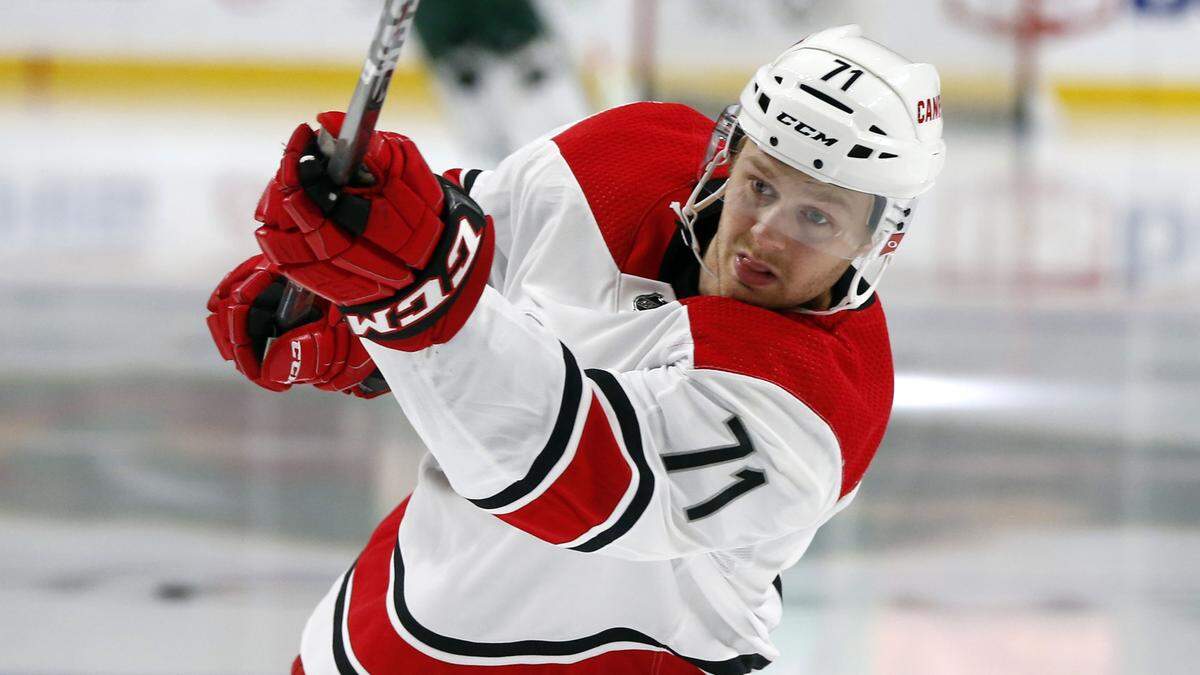 Carolina Hurricanes’ Lucas Wallmark of Sweden warms up before the first period of an NHL hockey game against the Minnesota Wild Saturday, Oct. 13, 2018, in St. Paul, Minn. (AP Photo/Jim Mone)